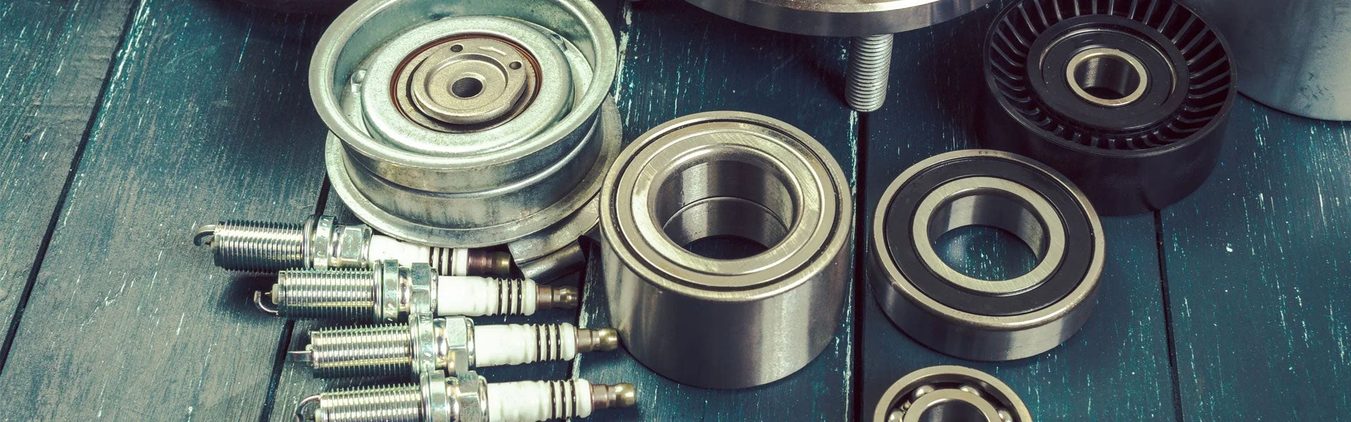 Vehicle parts including spark plugs